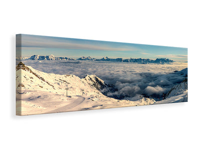 panoramic-canvas-print-above-the-clouds-in-the-snow